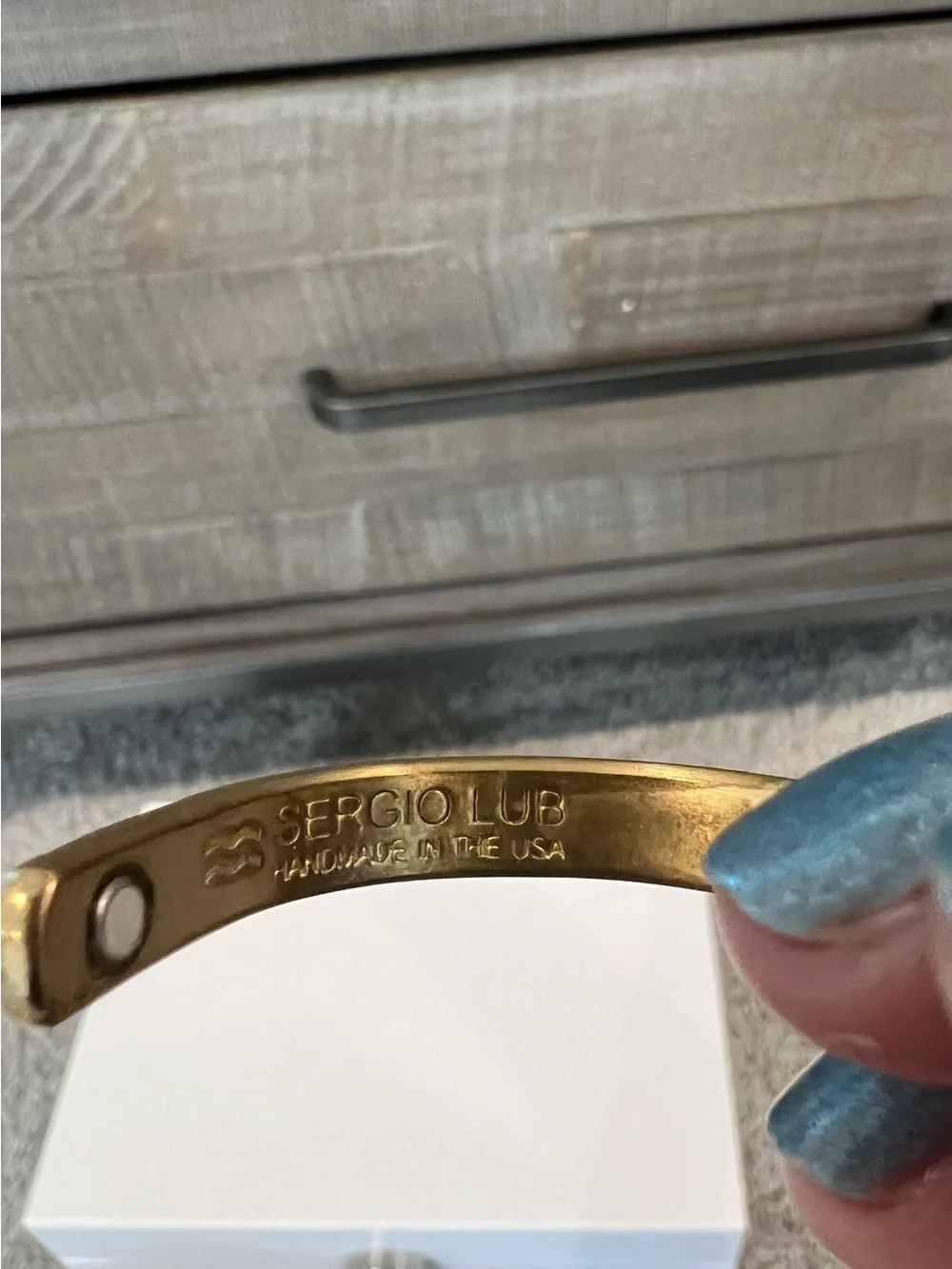 Sergio Lub gold tone “peace” and silver tone “love” cuff bracelets, extra small